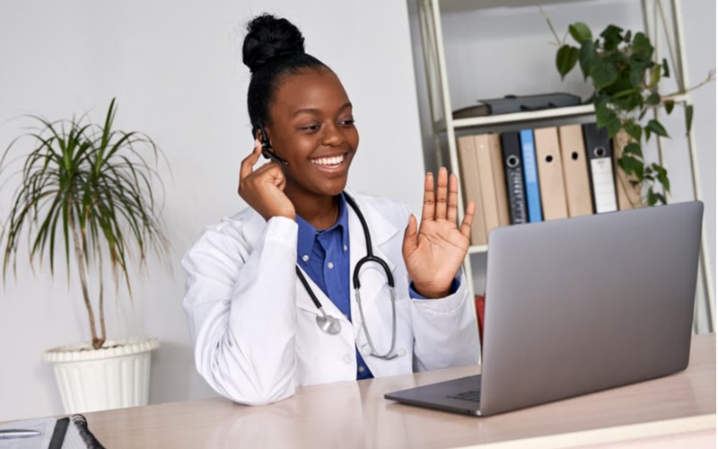 A doctor conducting a telemedicine appointment