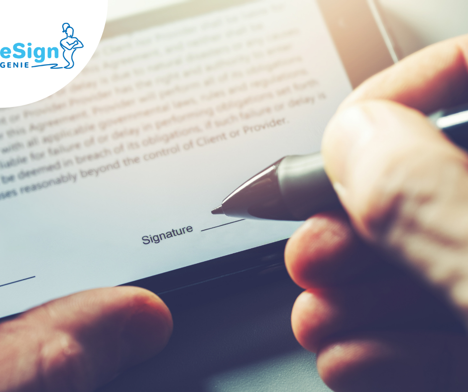 Image of someone signing using a signature maker